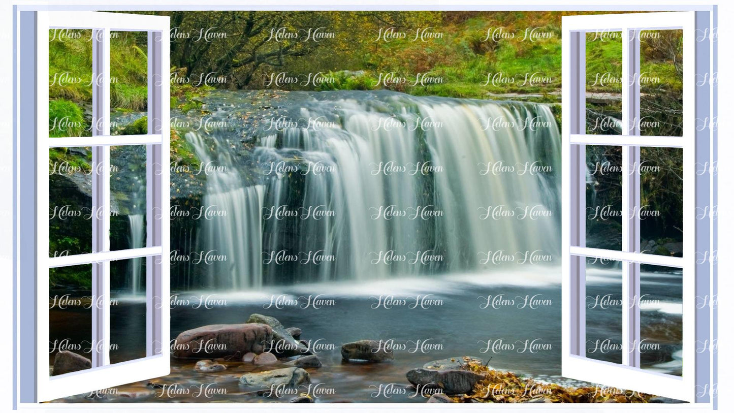 A fern lined waterfall view