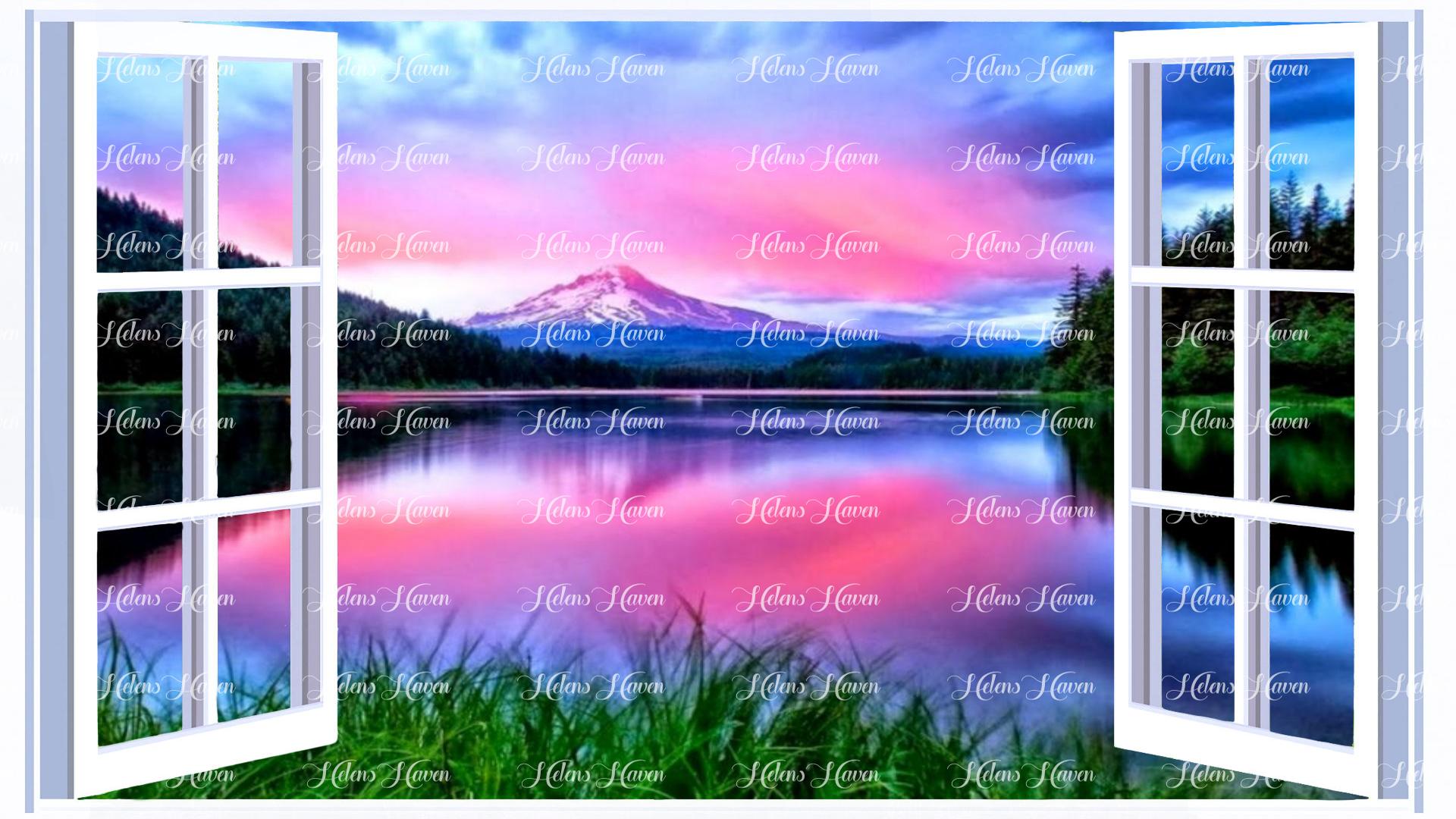 Pink sunset reflecting on a lake with as mountain in the background