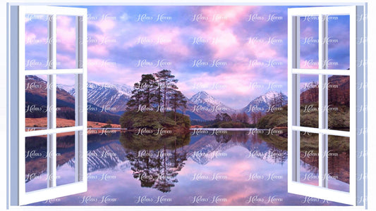 The sky and mountains at sunset reflecting in a lake