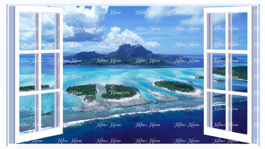 A view of coral laced islands with a mountainous island set in the middle