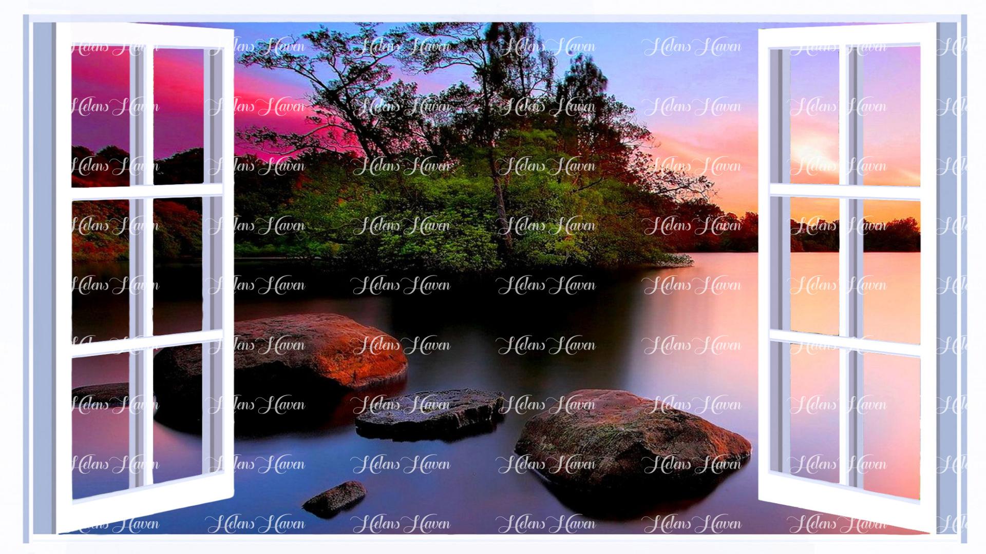 Stones form a pathway across a lake at sunset