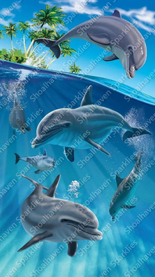 A playful group of dolphins in crystal blue waters