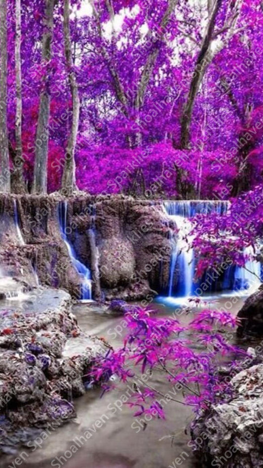 A beautiful waterfall with purple tree foliage